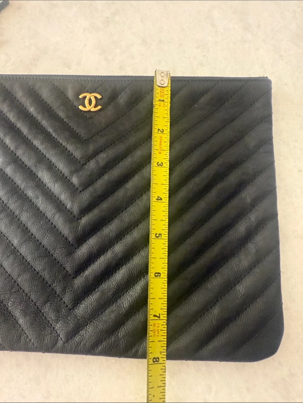 CHANEL Black Chevron Quilted Leather Zip Pouch with Gold CC